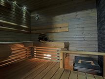Tunnelmallinen  sauna jossa heti valmis kiuas