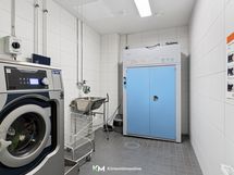 Taloyhtiön maksuton pesutupa.