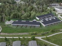 Ilmakuvaluonnos Raadelman Iriksestä. Yhtiö koostuu 3 rakennuksesta ja 17 kodista..