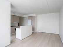 Keittiö ja olohuone. Kuva asunnosta A58, jossa vastaava pohjaratkaisu, materiaalit voivat poiketa.